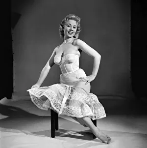 Clothing: Fashion: Underwear: Woman wearing corsett and petticoat. Model: Shane Condell