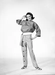 Clothing: Fashion: Woman wearing funny face trouser suit. 1964 B1723a-001