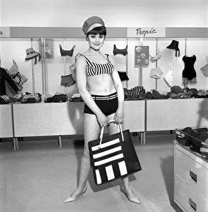 00436 Prints: Clothing: Fashions: Paris: Woman (Debbie Attwood) seen here shopping in a Paris