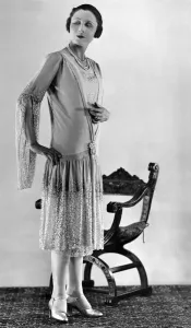 00040 Prints: Clothing. This very pleasing evening gown is of pale cyclamen georgette and lace