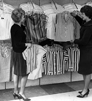 Co-op 1963 Fashion department women looking at blouses Circa 1963