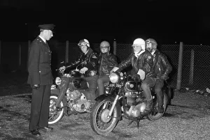 Coffee Bar Cowboys. PC Dennis Self demonstrates riding techniques to (left to right