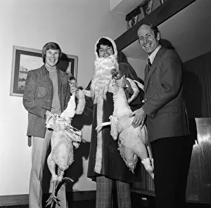 Colin Bell, Jimmy Tarbuck and Bobby Charlton pose with some turkeys. 23rd December 1971