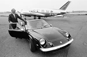 Motor Sports Prints: Colin Chapman (l) founder of the sports car company Lotus Cars