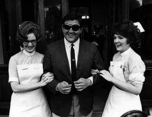 00066 Prints: Colin Milburn, June 1969 Cricket player pictured with nurses as he leaves