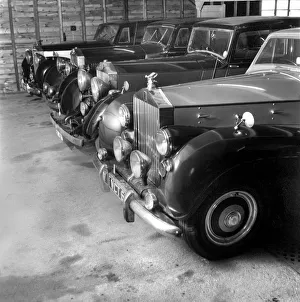 00067 Prints: A collection of Veteran Rolls Royce cars stored in a Nissen hut. 1963
