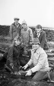 00523 Prints: Colne Valley school children dry stone walling at Delves Moor Farm, Slaithwaite