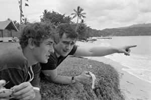 Comedian, actor and publisher Peter Cook with Dudley Moore a holiday in Grenada