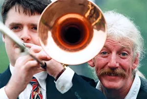 Comedian Brendan Healey (right) with trombone player Mitch Johnson from Dickinson Dees