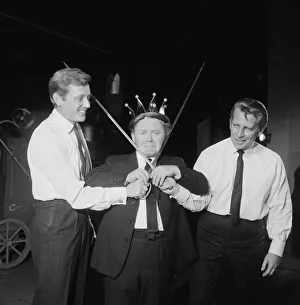 Comedian Charlie Drake poses with British singer and actor Gary Miller (left