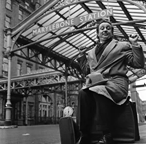 01003 Prints: Comedian Ken Dodd at Marylebone Station, London. 13th April 1964