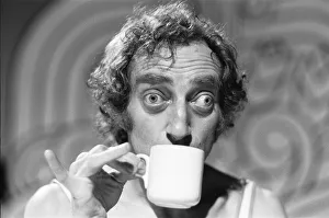 Comedian Marty Feldman poses for Mirror cameraman Ron Burton after his interview with