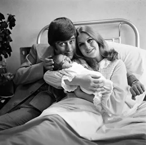 Comedian Mike Yarwood visits his wife Sandra and their new baby daughter Charlotte in