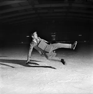 Comedian Norman Wisdom on ice. October 1953 D6365-003