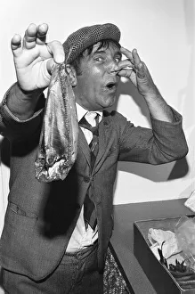 Fish Prints: Comedian Norman Wisdom seen here in the persona of hapless on screen character Norman