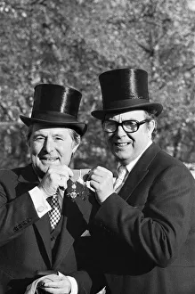 Comedians Prints: Comedians Morecambe and Wise seen here showing off their medals outside Buckingham Palace