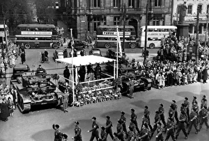 Two Comet Tanks flank the Lord Mayor of Newcastle as he takes the salute at the St
