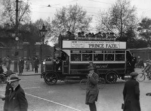 00278 Prints: Commuters crowd onto buses whilst others make their way home from work on foot