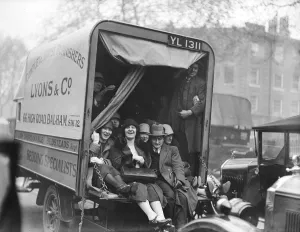 Lorry Prints: Commuters using make shift public transport to get to work on the second day of