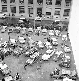 00095 Prints: Competitors prepare their cars for the next stage of the Daily Mirror World Cup Rally
