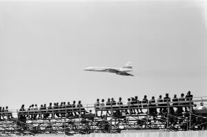 01157 Prints: The Concorde makes its first appearance at Farnborough Air Show by flying low over