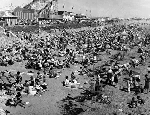 Coney Beach - Porthcawl - Holidaymakers enjoy the sunshine on the beach with
