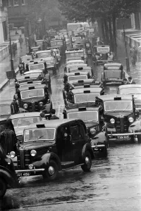 Congestion Prints: Congestion around a wet Earls Court in London where the 1959 Motor Show is taking place