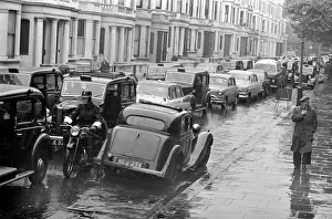 Congestion around a wet Earls Court in London where the 1959 Motor Show is taking place