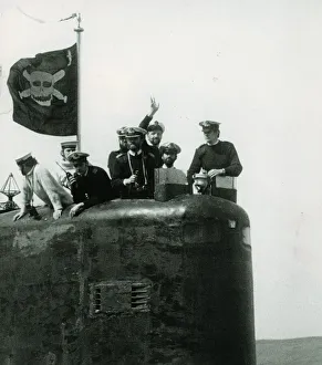 Nuclear Prints: The conning tower of HMS Conqueror with the captain and crew members flying the jolly