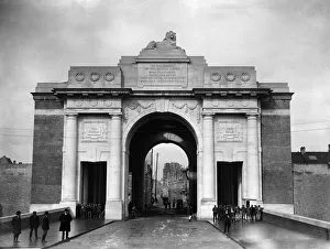 Belgium Prints: Construction workers and stone masons pose under the arch of the nearly completed