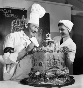 Chefs Prints: Too many cooks RAF cooks decorate a Coronation Lamprey Cake for the Queens