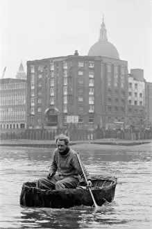 Coracle fishermen in London, on the River Thames at Southwark Bridge. 1st April 1972