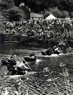 Coracle Racing - They re Off! Competitors in a coracle race at Cilgerran on Saturday