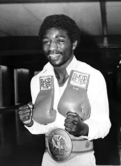 Cornelius Boza Edwards world junior lightweight boxing champion arriving at Heathrow