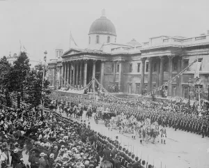 Coronation of King George V. Thousands of people cheer from the side of the road as
