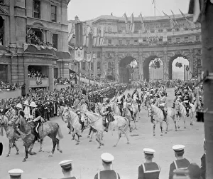 Colonialism Prints: Coronation of King George VI. Indian cavalry soldiers on horseback make their way