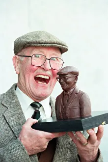 Coronation Street actor Bill Waddington with a chocolate bust of his character Percy