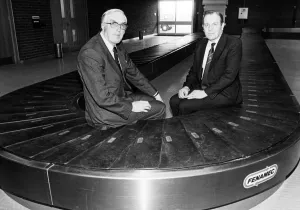 Carousel Prints: Councillor John Dyson, left, airport committee chairman, and Mr Ike Dawson
