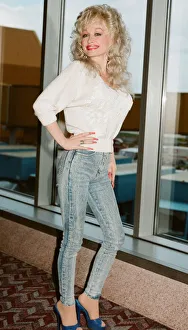 Country & Western singer Dolly Parton pictured here at London Airport shortly after