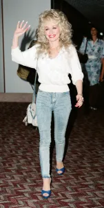 Country & Western singer Dolly Parton pictured here at London Airport shortly after