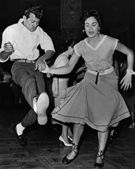 1950s Fashion Prints: A couple demonstrate rock n roll dancing at the Lyceum in London