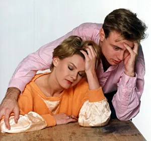 Unhappy Prints: Couple with a hangover the morning after a night of heavy drinking December