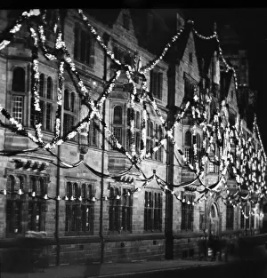 00101 Prints: Coventry City Council House, with Christmas bunting in the foreground of the image circa