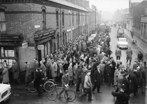 Division Two Prints: Coventry City fans queue for tickets to the second division title match against Wolves