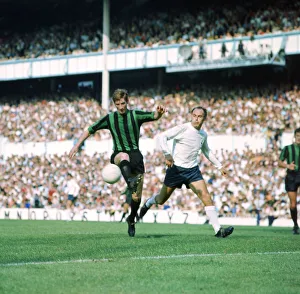 Coventry City footballer Geoff Strong in action with Alan Gilzean of Tottenham Hotspur
