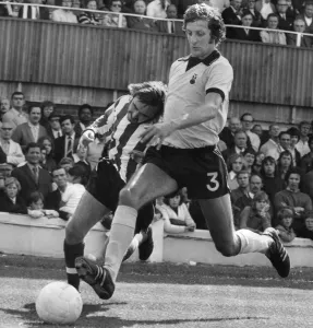 Coventry Citys left-back Chris Cattlin in a tackle with Sounthampton