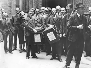00268 Prints: Coventrys town clerk Mr Fred Smith(right) and the scrutineers taking the Coventry