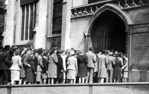 00112 Prints: Coventrys VE Day crowds flocked into Holy Trinity Church for the service after