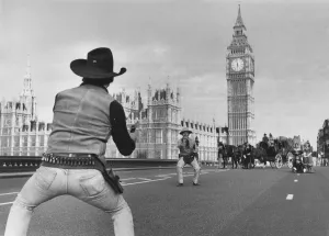 00077 Prints: Cowboys: Wild Westminster. Reach! Its a hold-up on the bridge as the gunmen stage