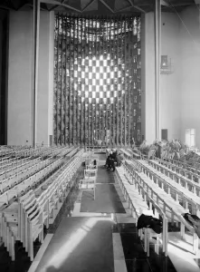 Craftsmen put the finishing touches to the new Coventry Cathedral which stands alongside